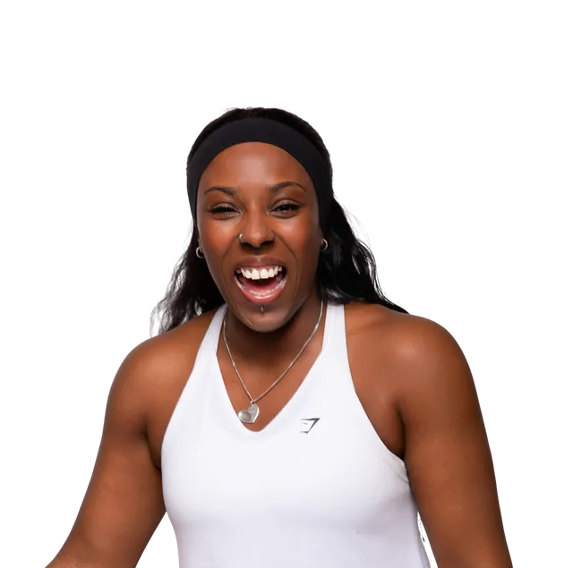 Faye Edwards laughing, in a white training top and headband